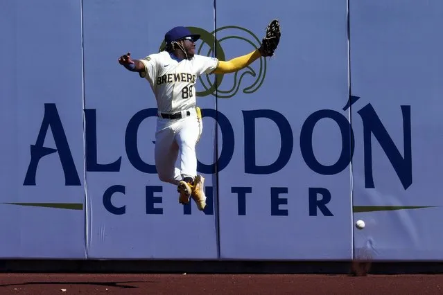 Milwaukee Brewers' Luis Lara can't catch a triple hit by Chicago White Sox's Kevin Pillar during the inning of a spring training baseball game, Wednesday, March 13, 2024, in Phoenix. (Photo by Matt York/AP Photo)