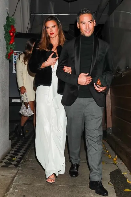Brazilian-American model Alessandra Ambrosio and her boyfriend Richard Lee arrive for a holiday party at Craig's in West Hollywood on December 14, 2021. (Photo by PeBu/Backgrid USA)