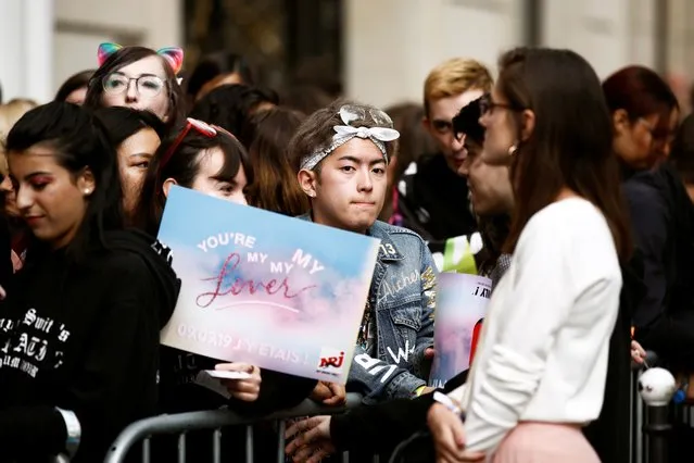 Fans of Taylor Swift wait in line to enter the Olympia Theatre prior to her concert performance in Paris, France, September 9, 2019. (Photo by Benoit Tessier/Reuters)