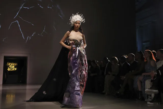 A model walks the runway at the Fashion For Relief charity event in central London, Saturday, September 14, 2019. (Photo by Vianney Le Caer/Invision/AP Photo)