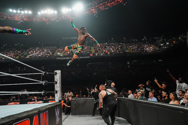 The wrestler Kofi Kingston in air against Akam during Monday Night RAW at CFG Bank Arena on August 5, 2024 in Baltimore, Maryland. (Photo by WWE/Getty Images)