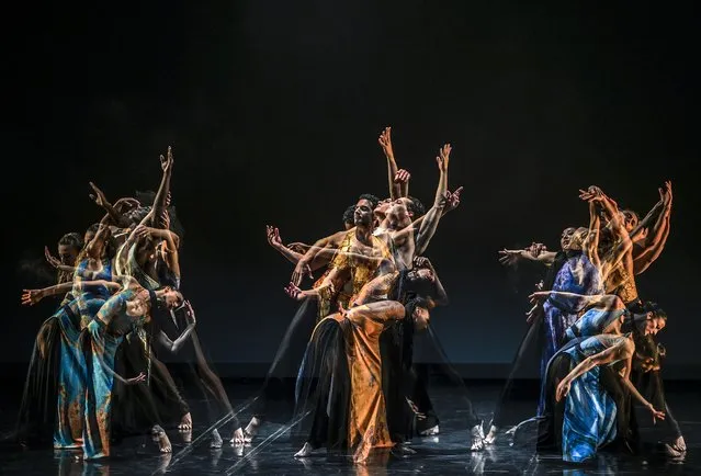 Members of the Martha Graham Dance Company perform in a multiple exposure photo during the last evening of the Skopje Dance Fest 2022 in Skopje, Republic of North Macedonia, 20 April 2022. The Martha Graham Dance Company, founded in 1926, is known for being the oldest American dance company. They presented 'Errand into the maze', “Immediate tragedy”, “Ritual to the sun from Acts of light”, and “Canticle for innocent comedians”. (Photo by Georgi Licovski/EPA/EFE)