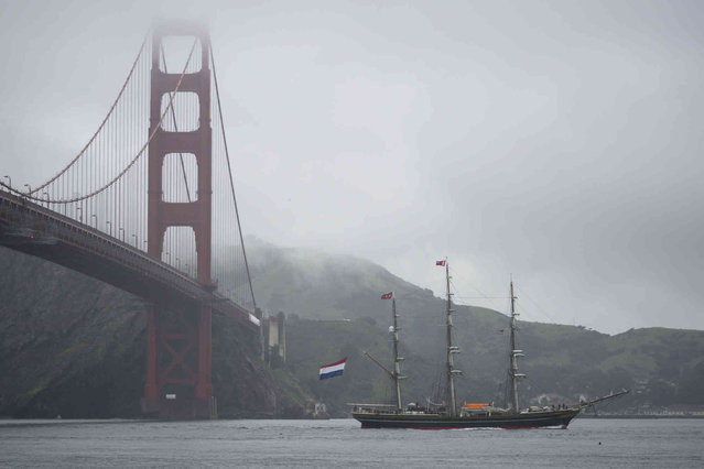 The Dutch tall ship Stad Amsterdam makes its way past the Golden Gate Bridge in San Francisco, Wednesday, March 6, 2024. The ship is visiting San Francisco and will be docked at Pier 30-32 until March 24 before continuing on its world tour. (Photo by Eric Risberg/AP Photo)