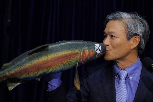 James Liao accepts the Physics Prize for ”Demonstrating and explaining the swimming abilities of a dead trout” during the 34th First Annual IgNobel Prizes ceremony, at the Massachusetts Institute of Technology in Cambridge, Massachusetts, on September 12, 2024. (Photo by Brian Snyder/Reuters)