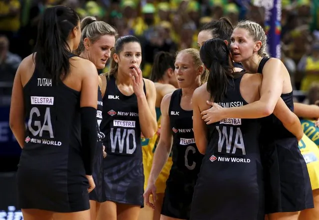 Members of the New Zealand team react after losing the Netball World Cup final game against Australia in Sydney, Australia, August 16, 2015. (Photo by David Gray/Reuters)
