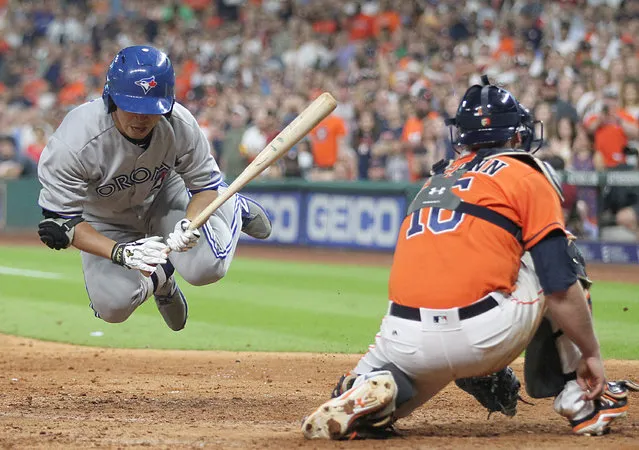 Toronto Blue Jays left fielder Norichika Aoki (23) avoids being hit by a pitch against the Houston Astros in the ninth inning at Minute Maid Park on August 4, 2017 in Houston, TX, USA. (Photo by Thomas B. Shea/USA TODAY Sports)