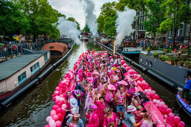 Around 80 boats of different organizations and non-profit organizations participated in the Canal Parade in Amsterdam, Netherlands on August 5, 2023. (Photo by Romy Arroyo Fernandez/NurPhoto/Rex Features/Shutterstock)