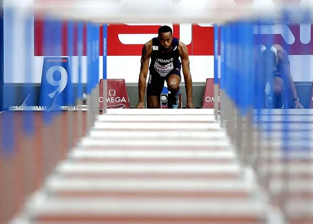 France's Dimitri Bascou prepares for his 110m hurdles heat during the European Athletics Championships in Zurich, Switzerland, Wednesday, August 13, 2014. (Photo by Petr David Josek/AP Photo)
