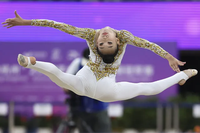Dong Zhiyi of China competes during the all-around final event of the rhythmic gymnastics on day four of the National Rhythmic Gymnastics Championship at Huanglong Sports Center on August 26, 2022 in Hangzhou, China. (Photo by Lintao Zhang/Getty Images)
