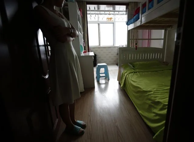 Liu, whose husband Lu was onboard Malaysia Airlines Flight MH370 which disappeared on March 8, 2014, shows a room which they prepared for their future babies during an interview with Reuters in Beijing July 18, 2014. (Photo by Kim Kyung-Hoon/Reuters)