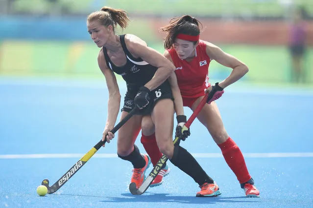 Petrea Webster of New Zealand Hyoju An of Korea compete for the ball during the women's pool A match between New Zealand and the Republic of Korea on Day 2 of the Rio 2016 Olympic Games at the Olympic Hockey Centre on August 7, 2016 in Rio de Janeiro, Brazil. (Photo by Getty Images/Getty Images)