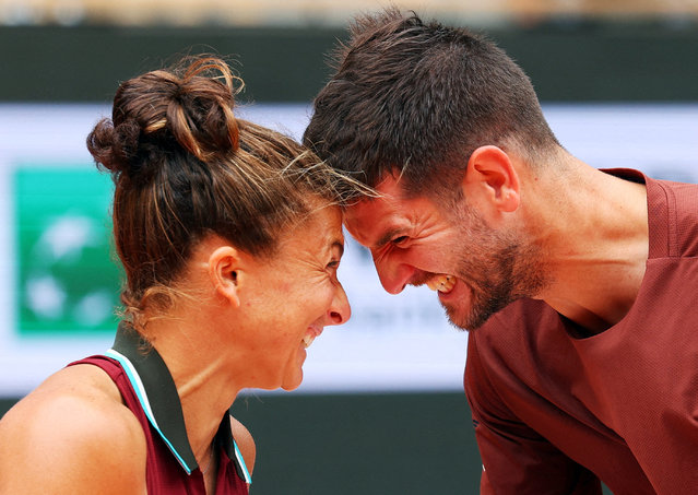 Italy's Sara Errani and Andrea Vavassori celebrate on the podium after winning their mixed doubles final match against Taylor Townsend and Evan King of the U.S on June 5, 2025. (Photo by Denis Balibouse/Reuters)