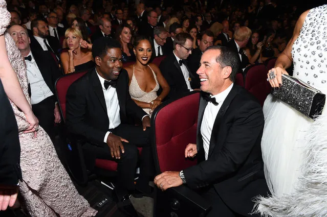 Chris Rock, left, and Jerry Seinfeld appear in the audience at the 68th Primetime Emmy Awards on Sunday, September 18, 2016, at the Microsoft Theater in Los Angeles. (Photo by Charles Sykes/Invision for the Television Academy/AP Images)