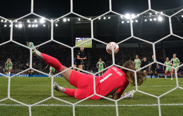England's Chloe Kelly has a penalty kick saved by Italy goalkeeper Laura Giuliani before scoring the rebound for England's second goal of the game during the UEFA Women's Euro 2025 semi-final match at the Stade de Geneve, Switzerland on Tuesday, July 22, 2025. (Photo by Nick Potts/PA Wire)