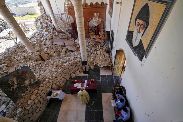 Worshippers gather for Easter Mass inside the ruins of St. George Melkite Catholic Church, damaged by Israeli airstrike, in Dardghaya, southern Lebanon, Sunday, April 20, 2025. (Photo by Hassan Ammar/AP Photo)