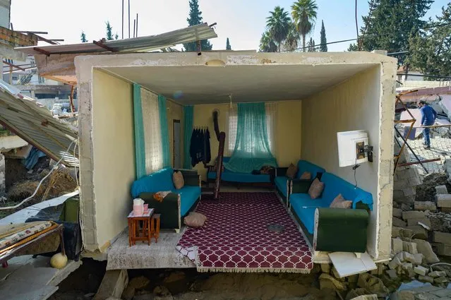 A view of a living room in Demirkopru, a small detroyed Turkish village now divided by a large crack in Hatay on February 18, 2023. A 7.8-magnitude earthquake hit near Gaziantep, Turkey, in the early hours of February 6, followed by another 7.5-magnitude tremor just after midday. The quakes caused widespread destruction in southern Turkey and northern Syria and has killed more than 40,000 people (Photo by Yasin Akgul/AFP Photo)