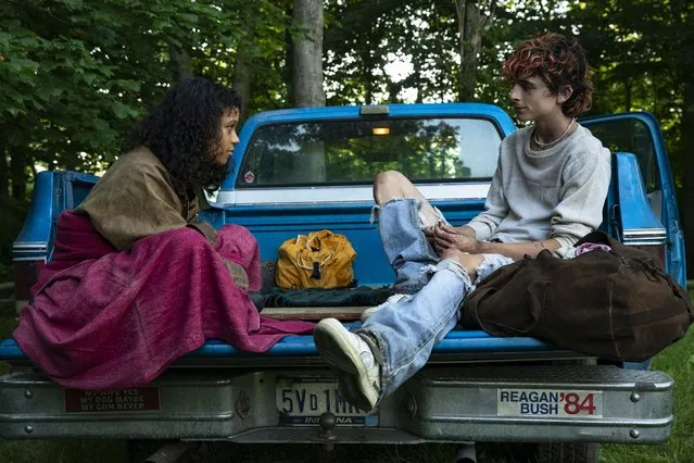 This image released by MGM shows Taylor Russell, left, and Timothée Chalamet in a scene from “Bones and All”. (Photo by Yannis Drakoulidis/Metro Goldwyn Mayer Pictures via AP Photo)