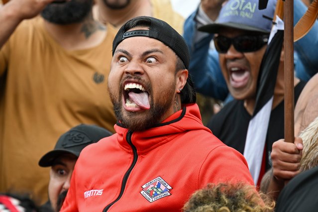 A protester reacts outside New Zealand's parliament during a demonstration against a proposed law that would redefine the country's founding agreement between Indigenous Māori and the British Crown, in Wellington Tuesday, November 19, 2024. (Photo by Mark Tantrum/AP Photo)