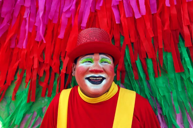 A clown poses for a portrait on the waterfront of Xolotlan Lake in Managua, Nicaragua, November 4, 2016. (Photo by Oswaldo Rivas/Reuters)