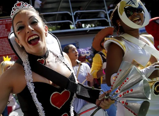 A reveller in costume takes part in the “Desliga da Justica” carnival parade during pre-carnival festivities in Rio de Janeiro, Brazil, January 23, 2016. (Photo by Sergio Moraes/Reuters)