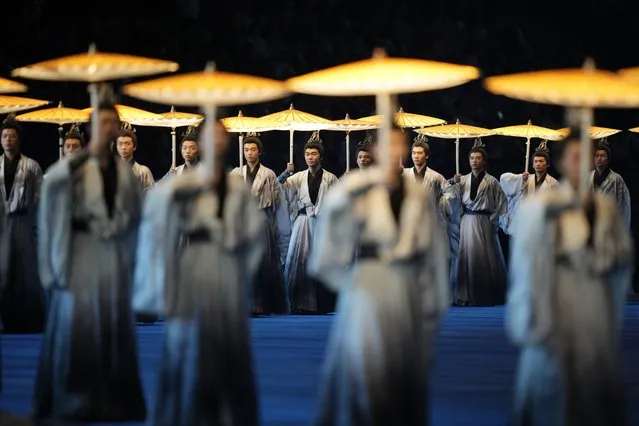 Dancers perform during the opening ceremony of the 19th Asian Games in Hangzhou, China, Saturday, September 23, 2023. (Photo by Vincent Thian/AP Photo)