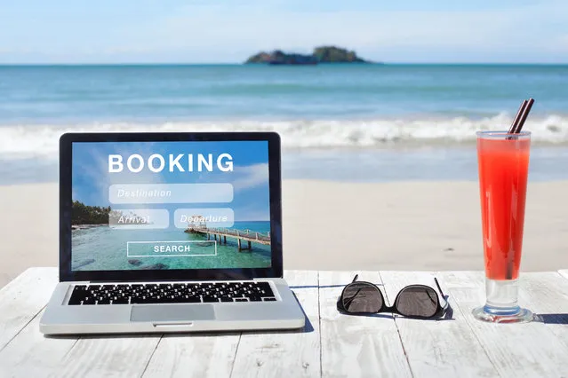 Travel booking, hotels and flights reservation on the screen of computer. (Photo by Alamy Stock Photo)