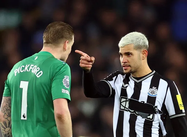 Jordan Pickford of Everton clashes with Bruno Guimaraes of Newcastle United at full-time following the Premier League match between Everton FC and Newcastle United at Goodison Park on December 07, 2023 in Liverpool, England. (Photo by Carl Recine/Reuters)