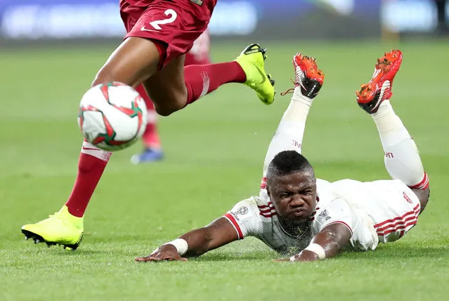 Ismail Al Hamadi of United Arab Emirates in action with Qatar's Ro-Ro during the first half of their 4-0 win over the United Arab Emirates in an Asian Cup semifinal in Abu Dhabi on Jan. 29, 2019. (Photo by Suhaib Salem/Reuters)