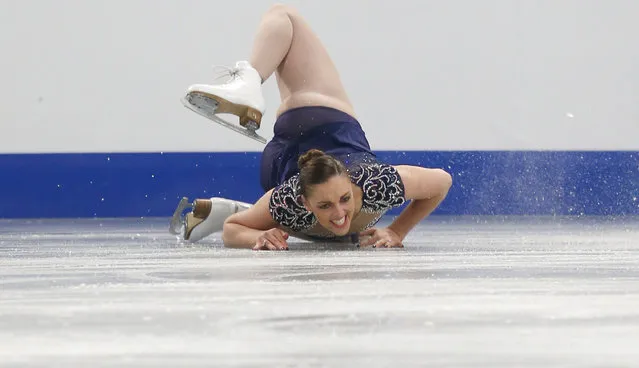 Great Britain's Jenna McCorkell falls during the women's short program at the European Figure Skating Championships in Budapest, Hungary, Wednesday, Jan. 15, 2014. (Photo by Darko Bandic/AP Photo)