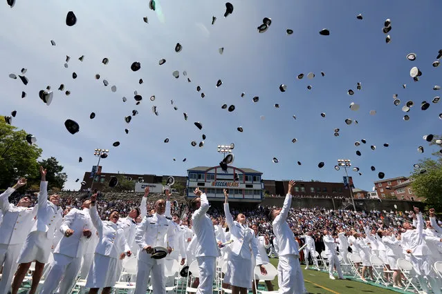 Members of the United States Coast Guard Academy, graduating class of 2019, throw their hats during a graduation ceremony at the U.S. Coast Guard Academy in New London, Connecticut, U.S., May 22, 2019. (Photo by Michelle McLoughlin/Reuters)