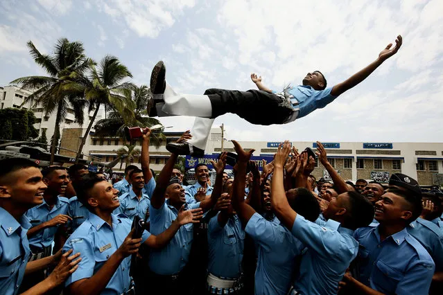 Indian Air Force (IAF) newly trained Medical Assistants celebrates after passing out parade at Medical Training Centre, in Bangalore, India, 28 June 2019. Around 75 trained medical assistants of Indian Air Force officers, culmination of basic military training and professional combat skills on completion of initial Joint Basic Phase Training (JBPT-24) during their 24 weeks training course. (Photo by Jagadeesh N.V./EPA/EFE)