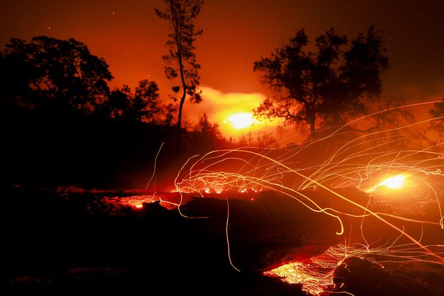 This photograph shows the Lake Fire burning in Los Olivos California, on July 9, 2024. (Photo by David Swanson/AFP Photo)