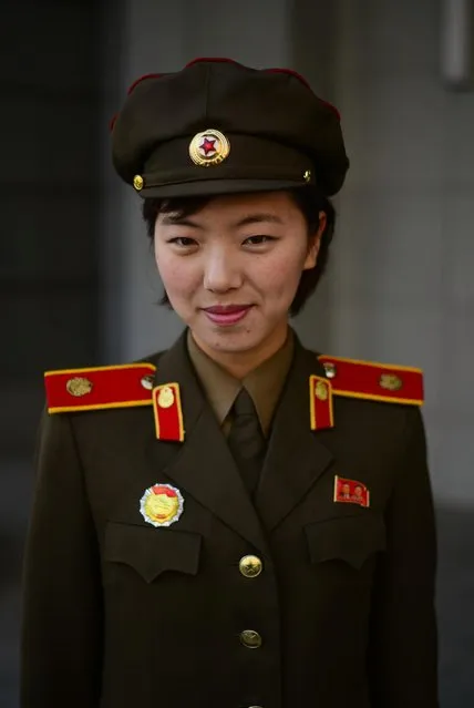 A local army officer poses for a quick photo at the Victorious War Museum in Pyongyang. (Photo by Gavin John/Mediadrumworld.com)