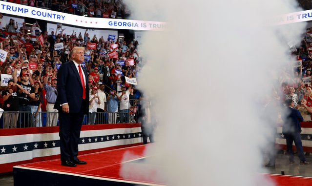 A smoke machine goes off as Republican presidential nominee, former U.S. President Donald Trump is introduced during a campaign rally at the Georgia State University Convocation Center on August 03, 2024 in Atlanta, Georgia. Polls currently show a close race between Trump and Democratic presidential candidate, U.S. Vice President Kamala Harris. (Photo by Joe Raedle/Getty Images)