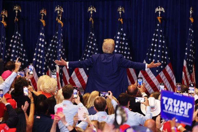 Republican presidential nominee, former U.S. President Donald Trump leaves the stage after speaking during a campaign rally at Nassau Veterans Memorial Coliseum on September 18, 2024 in Uniondale, New York. Trump held his first rally after Saturday's apparent assassination attempt, the second one in two months after being injured at a rally in Butler, Pennsylvania. (Photo by Michael M. Santiago/Getty Images)