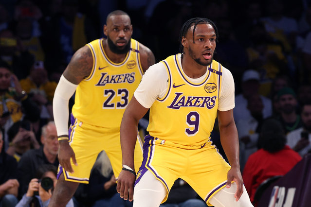 LeBron James #23 and Bronny James #9 of the Los Angeles Lakers on defense during the second quarter against the Minnesota Timberwolves at Crypto.com Arena on October 22, 2024 in Los Angeles, California. (Photo by Harry How/Getty Images)