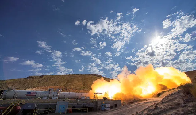 The SLS Five-Segment Solid Rocket Motor, that will launch NASA’s Space Launch System and Orion spacecraft to deep space, undergoes a static test fire at the Orbital ATK facility in Promontory, Utah, U.S., in this June 28, 2016 handout photo. (Photo by Bill Ingalls/Reuters/NASA)