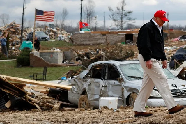 President Donald Trump tours damage from Tuesday's tornadoes and meets with federal and local response officials in Cookeville, Tennessee, March 6, 2020. (Photo by Tom Brenner/Reuters)