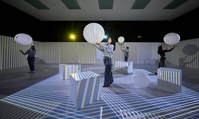 Chromointerferent Environment, 1974-2019 by Carlos Cruz-Diez at Tate Modern’s major new exhibition Electric Dreams: Art and Technology Before the Internet in London on November 25, 2024. The show celebrates the early innovators of optical, kinetic, programmed and digital art who pioneered a new era of immersive sensory installations and automatically-generated works. (Photo by David Levene/The Guardian)