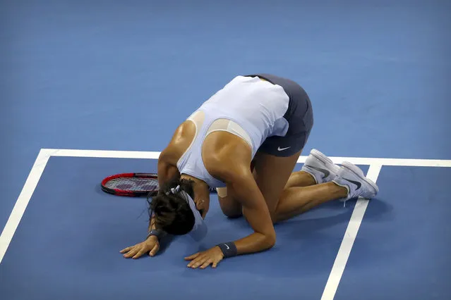 Caroline Garcia of France reacts after beating Simona Halep of Romania in their women's singles championship match in the China Open tennis tournament at the Diamond Court in Beijing, Sunday, October 8, 2017. (Photo by Mark Schiefelbein/AP Photo)