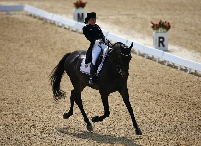 Thailand's Princess Sirivannavari Nariratana riding Prince Charming Wpa performs during the equestrian Dressage Team competition at the Dream Park Equestrian Venue during the 17th Asian Games in Incheon September 20, 2014. (Photo by Kim Hong-Ji/Reuters)