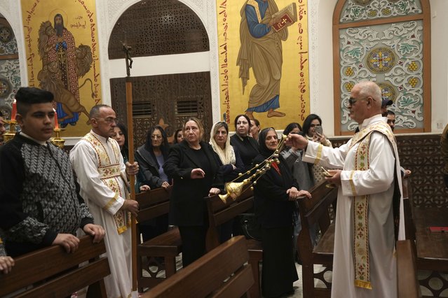 Iraqi Christians attend a Christmas Eve mass at the Sacred Heart Church of the Syriac Catholics in Basra, Iraq, Tuesday, December 24, 2024. (Photo by Nabil al-Jurani/AP Photo)
