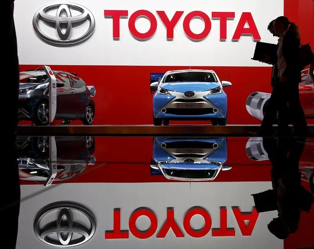 Visitors pass by the Toyota stall during the media day at the Frankfurt Motor Show (IAA) in Frankfurt, Germany September 15, 2015. (Photo by Kai Pfaffenbach/Reuters)