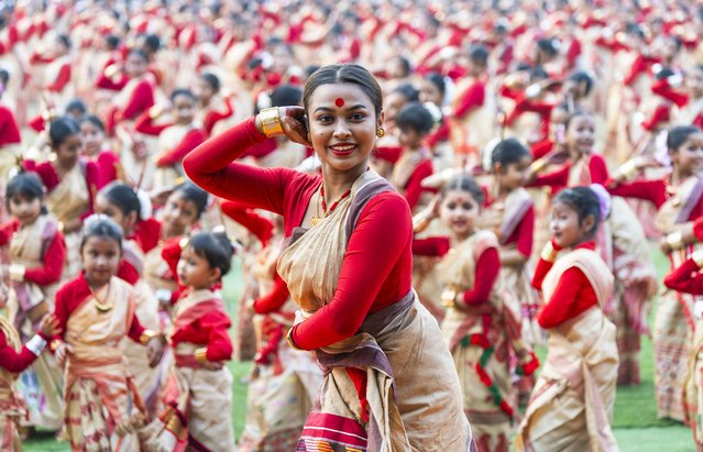 An instructor dances as participants follow the dance steps in a Bihu dance workshop ahead of the Rongali Bihu Festival in Guwahati, India, on April 8, 2025. (Photo by David Talukdar/NurPhoto/Rex Features/Shutterstock)