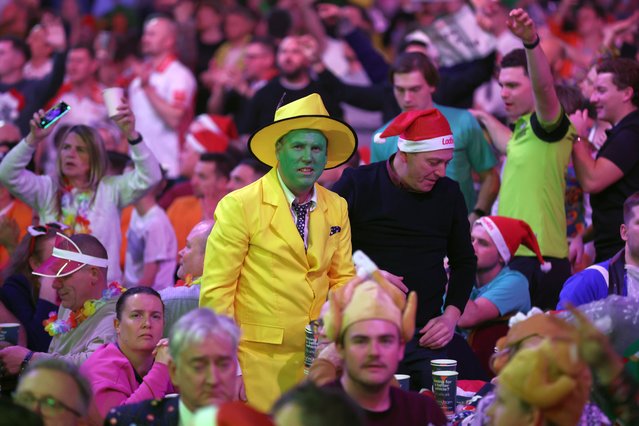 Fans enjoy the darts During Day Eight of The Cazoo World Darts Championship at Alexandra Palace on December 22, 2022 in London, England. (Photo by Luke Walker/Getty Images)