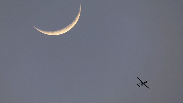 A drone flies over over Gaza Strip as seen from southern Israel, Thursday, May 29, 2025. (Photo by Ohad Zwigenberg/AP Photo)