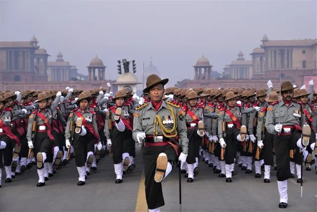 Soldiers of Assam Rifles, an Indian paramilitary force, practice march-past for the upcoming Republic day parade at the Raisina hills, in New Delhi, India, Thursday, January 19, 2023. India's Republic day will be celebrated on Jan. 26. (Photo by Manish Swarup/AP Photo)