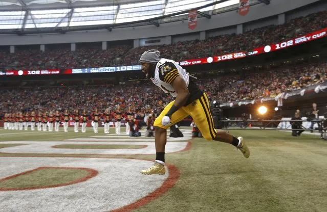 Hamilton Tiger Cats' Simoni Lawrence is introduced during ceremonies ahead of the start of the CFL's 102nd Grey Cup football championsionship against the Calgary Stampeders in Vancouver, British Columbia, November 30, 2014. (Photo by Todd Korol/Reuters)