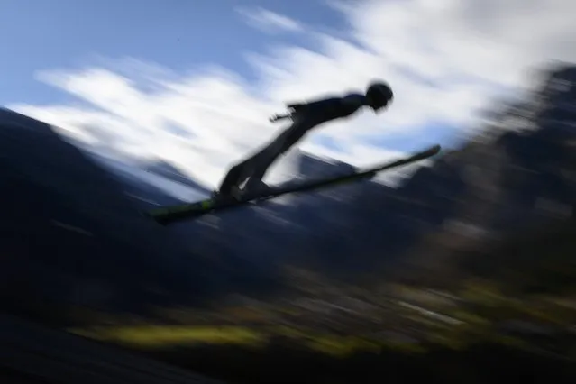 A Swiss ski jumper during the training of the ski jumpers in the Nordic Arena, on Wednesday, October 28, 2020, in Kandersteg, Switzerland. (Photo by Anthony Anex/Keystone)