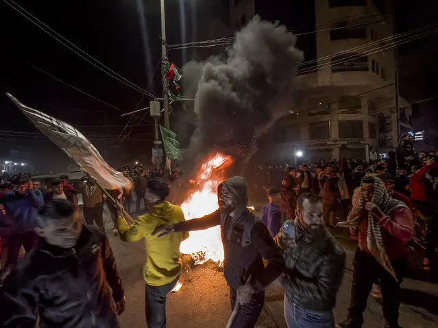 Palestinians celebrate in the streets of Gaza in the Gaza Strip, 27 January 2023, following a shooting attack near a synagogue in Jerusalem. According to the Israeli Foreign Ministry, at least eight people were killed and ten more injured in a shooting attack at a synagogue in Jerusalem. (Photo by Mohammed Saber/EPA/EFE)